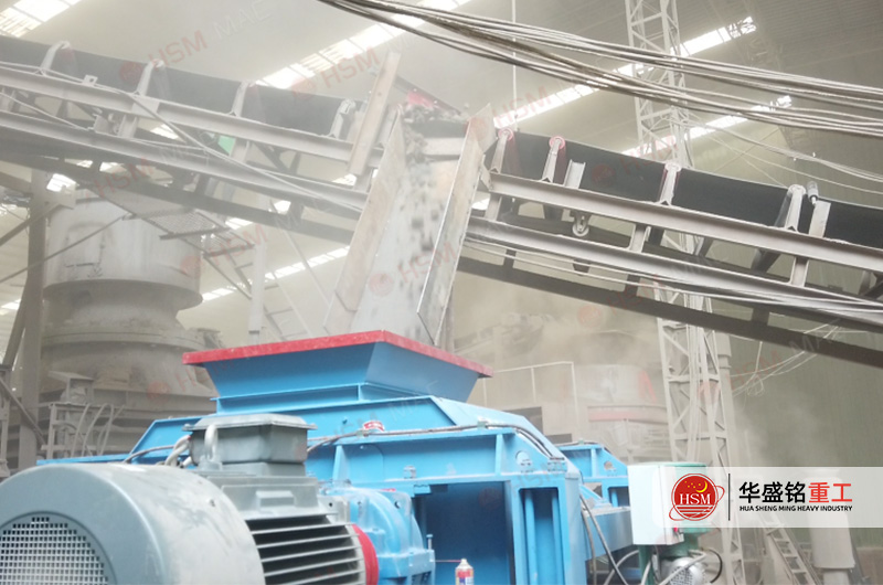 On-site photo of the 900×1200 HSM Toothed Roll Crusher processing large raw limestone rocks during primary crushing On-site photo of the 900×1200 HSM Toothed Roll Crusher processing large raw limestone rocks during primary crushing